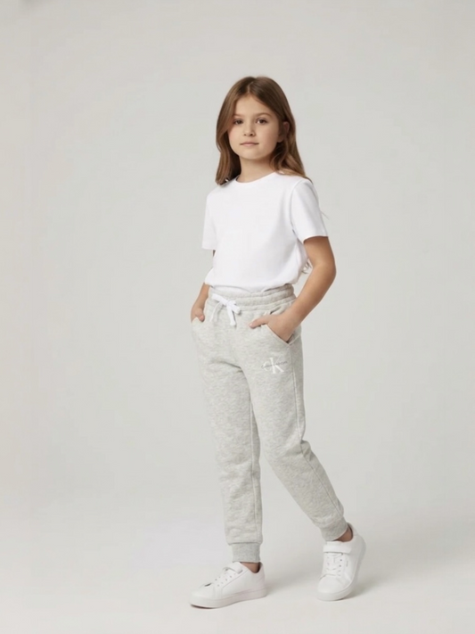 Pantaloni trening Calvin Klein Jeans - crem cu logo imprimat