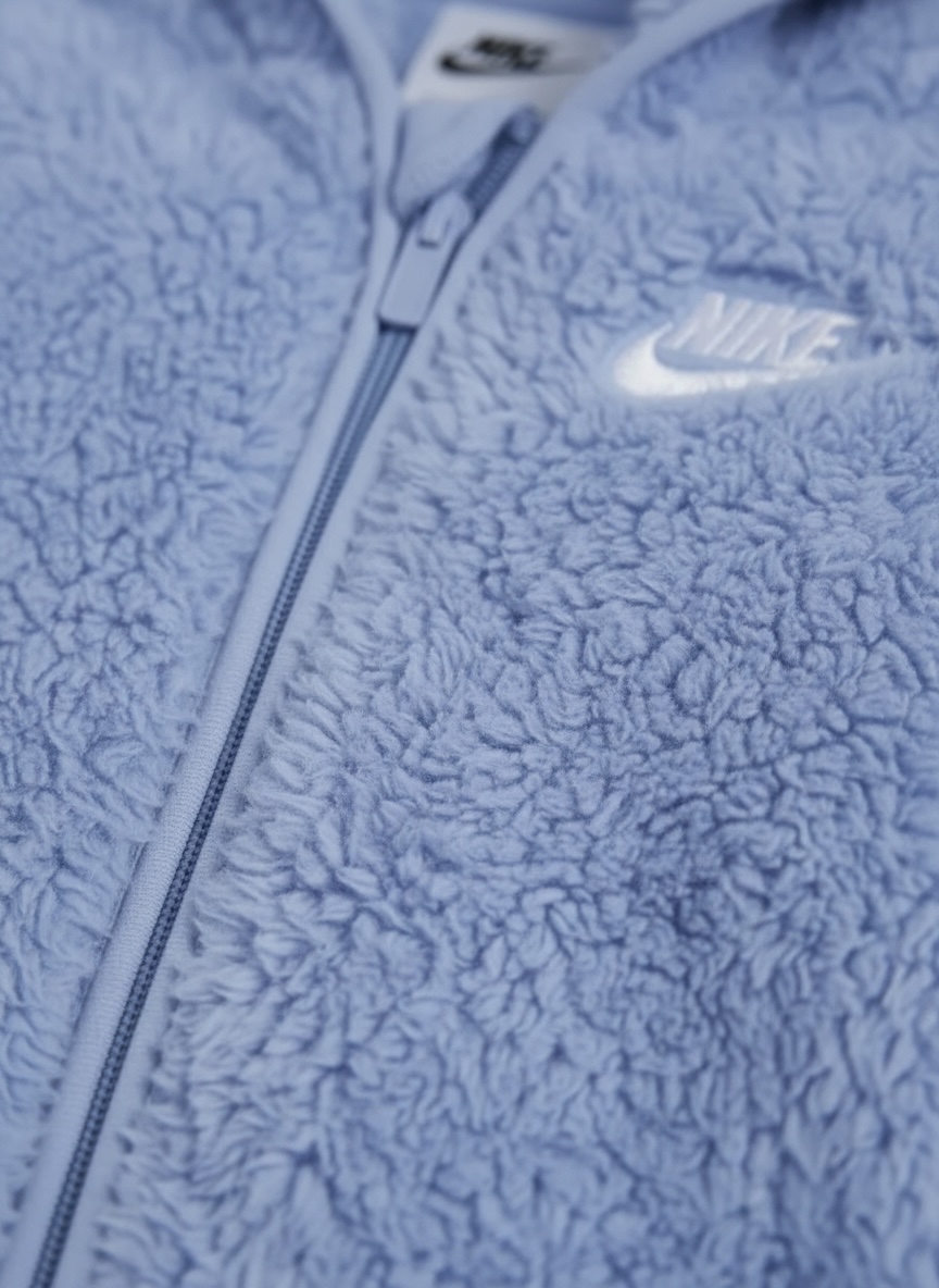 Combinezon plusat Nike bleu cu logo brodat